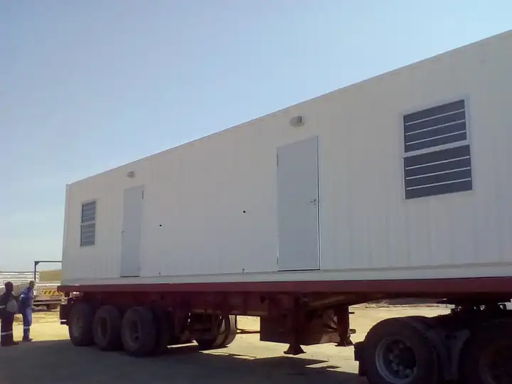 160-man camp: on its way to site