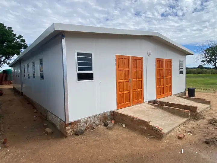Completed KLD dormitory with double doors and access ramps